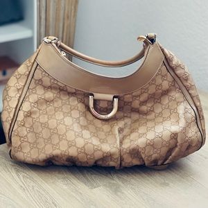 LIKE NEW*** MUST HAVE GUCCI GOLD PURSE